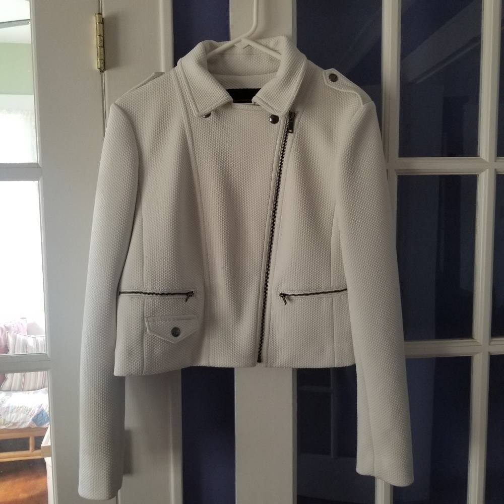 Women's white jacket.